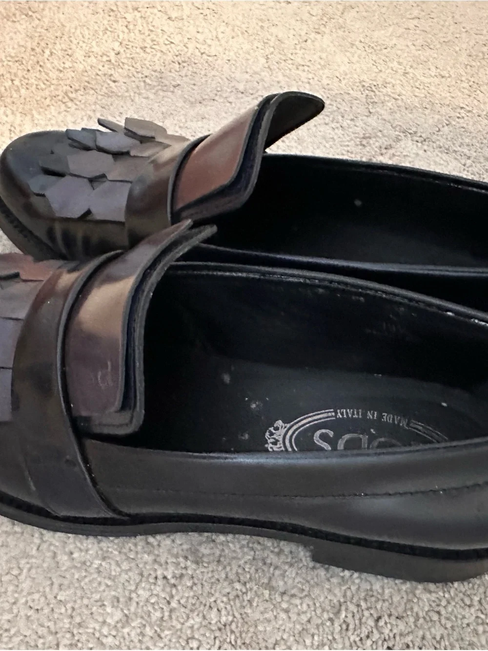 Tod's Black Leather Kiltie Penny Loafers